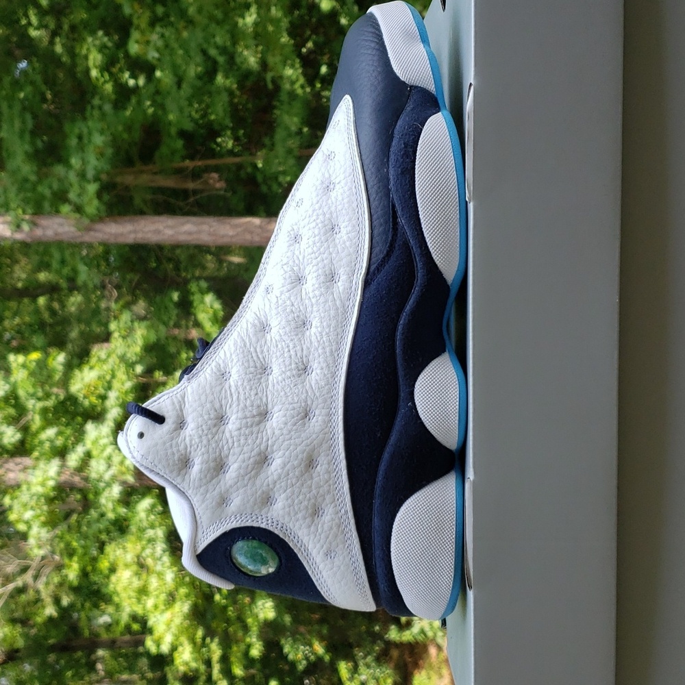 Used men size 10 - Jordan retro 13 obsidan powder blue white